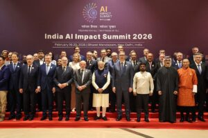 Senior delegates at the India AI Impact Summit pose for a group photo