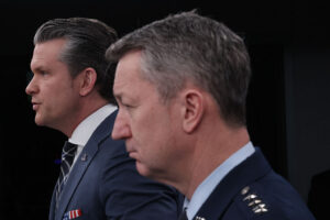GettyImages 2267378923 Secretary of War Pete Hegseth and Chairman of the Joint Chiefs of Staff Dan Caine speak at a press conference